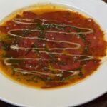 DISH OF THE WEEK in Bayonne, France: Spanish Merluza en Salsa Verde at CHEZ TXOTX